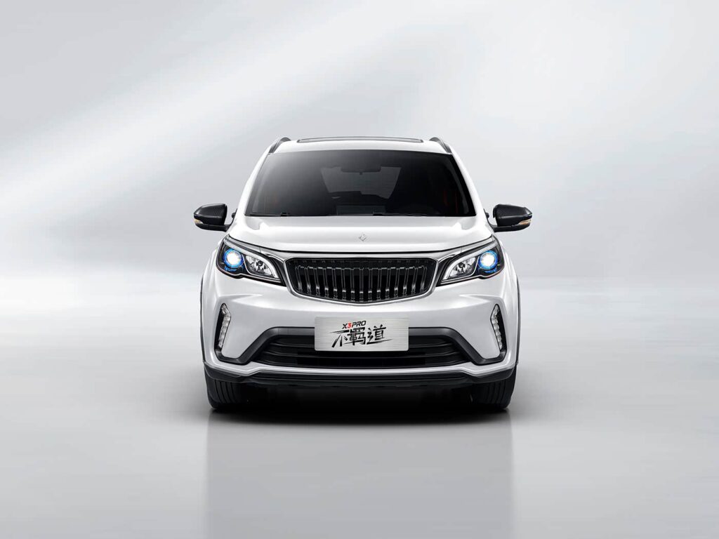 RL Auto X3 PRO driving on a coastal road, showcasing its sleek profile and urban adventure capability.